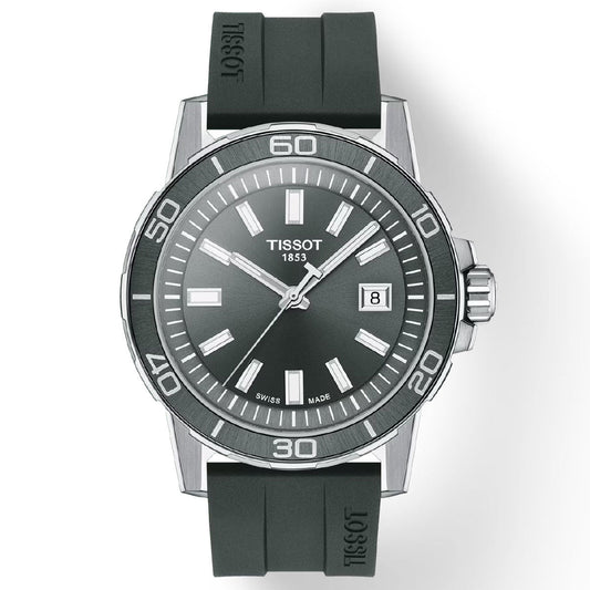 The Tissot Supersport Gent Quartz 44mm Watch boasts a dark grey dial with prominent white markers and a date display located at the 3 o'clock position. It is driven by Swiss quartz movement and features a black bezel adorned with silver numerals. The watch is constructed with durable sapphire crystal and comes with a black rubber strap, showcasing "Tissot 1853" and "Swiss Made" on the display.