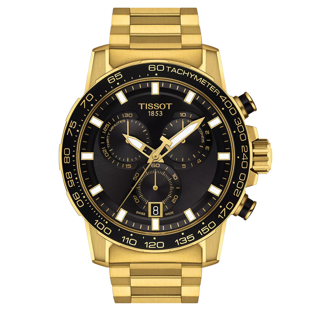 The Tissot Supersport Chrono Quartz 45.5mm Watch features a gold-tone stainless steel case, black dial with three subdials, date at 6 o'clock, gold markers and hands, tachymeter bezel, and precise Swiss quartz movement.