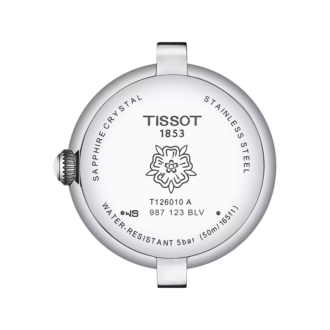 Back view of the Tissot Bellissima Small Lady Quartz 26mm Watch shows engraved details: Tissot 1853 logo, floral design, stainless steel case, sapphire crystal inscription, model number, and Swiss Quartz movement marking.