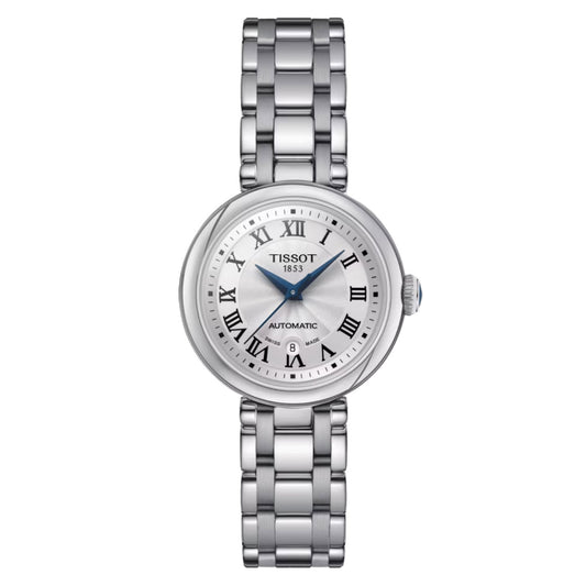 The Tissot Bellissima Automatic 29mm Watch by Tissot features a silver stainless steel band and round face, adorned with Roman numerals, a striking blue center, and an "1853" marking. It boasts Swiss Automatic Movement with the word "Automatic" above a date display at the bottom, all safeguarded by Sapphire Crystal.