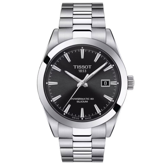 The Tissot Gentleman Powermatic 80 Automatic Silicium 40mm Watch comes in silver and features a black dial adorned with silver hour markers and hands. It includes a date display at the 3 o'clock position. Made from a durable 316L stainless steel case, it offers an impressive 80-hour power reserve due to its Swiss automatic movement, with the text "Tissot 1853 Powermatic 80 Silicium" displayed on it.