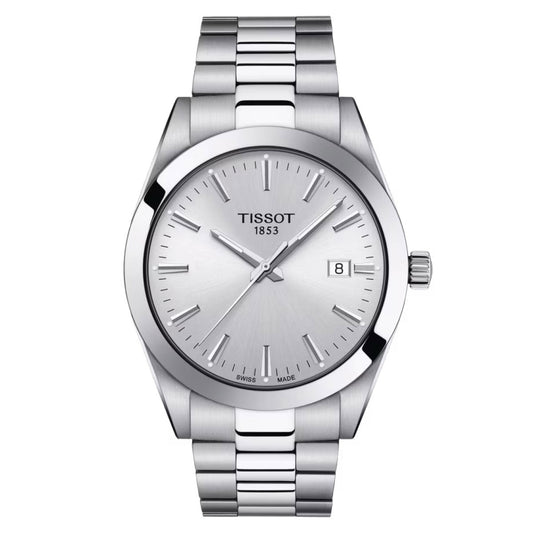 The Tissot Gentleman Quartz 40mm Watch, crafted in silver, showcases a round face with a date display at the 3 o'clock position and employs Swiss Quartz Movement for accurate timekeeping. It includes a stainless steel band and straightforward hour markers, with "Tissot 1853" prominently displayed on the dial, all housed in robust 316L Stainless Steel.