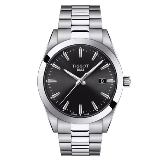 The Tissot Gentleman Quartz 40mm Watch boasts Swiss Quartz Movement, featuring a silver dial with black hour markers. It includes a date display at the 3 o'clock position and is complemented by a stainless steel bracelet enhanced with sapphire crystal, ensuring both durability and elegance.