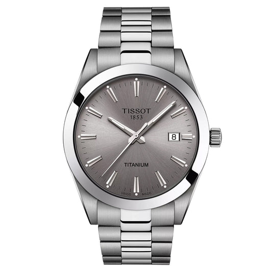 The Tissot Gentleman Titanium Quartz 40mm Watch features a titanium case and bracelet, gray dial with silver markers and hands, Swiss Quartz movement, date at 3 o'clock, and "Tissot 1853" on the upper dial.