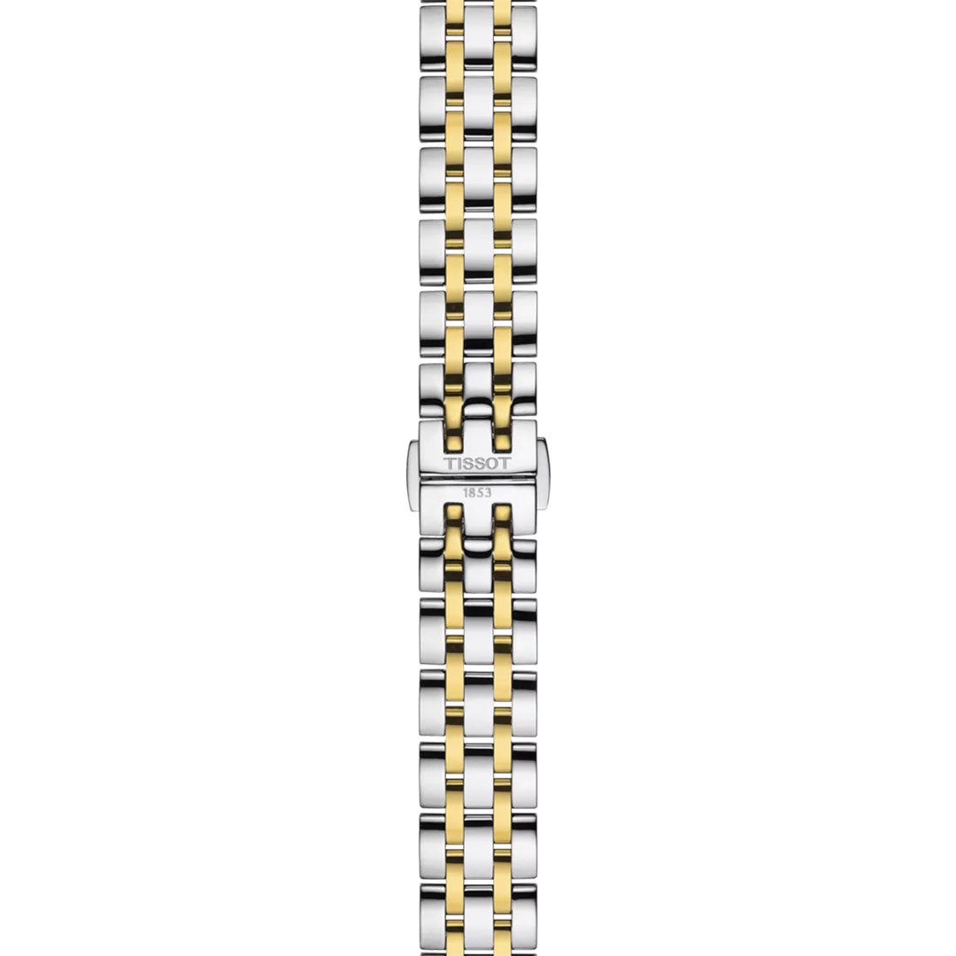 The Tissot Classic Dream Quartz 28mm Watch features a stylish metal band with alternating gold and silver links, a clasp engraved with the Tissot logo and "1853," shown against a plain white background.