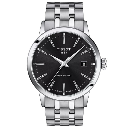The Tissot Classic Dream Swissmatic 42mm Watch features a stainless steel case, black dial with silver markers and hands, date at 3 o’clock, link bracelet, “Tissot 1853” and “Swissmatic” on the dial, and a 72-hour power reserve.