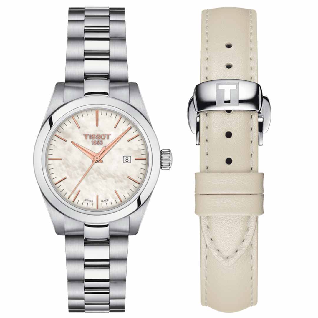 The Tissot T-My Lady Quartz 29mm Watch from Tissot showcases a silver case with a mother-of-pearl dial and a date display, elegantly complemented by a cream-colored interchangeable leather strap adorned with the iconic "T" logo on the clasp.