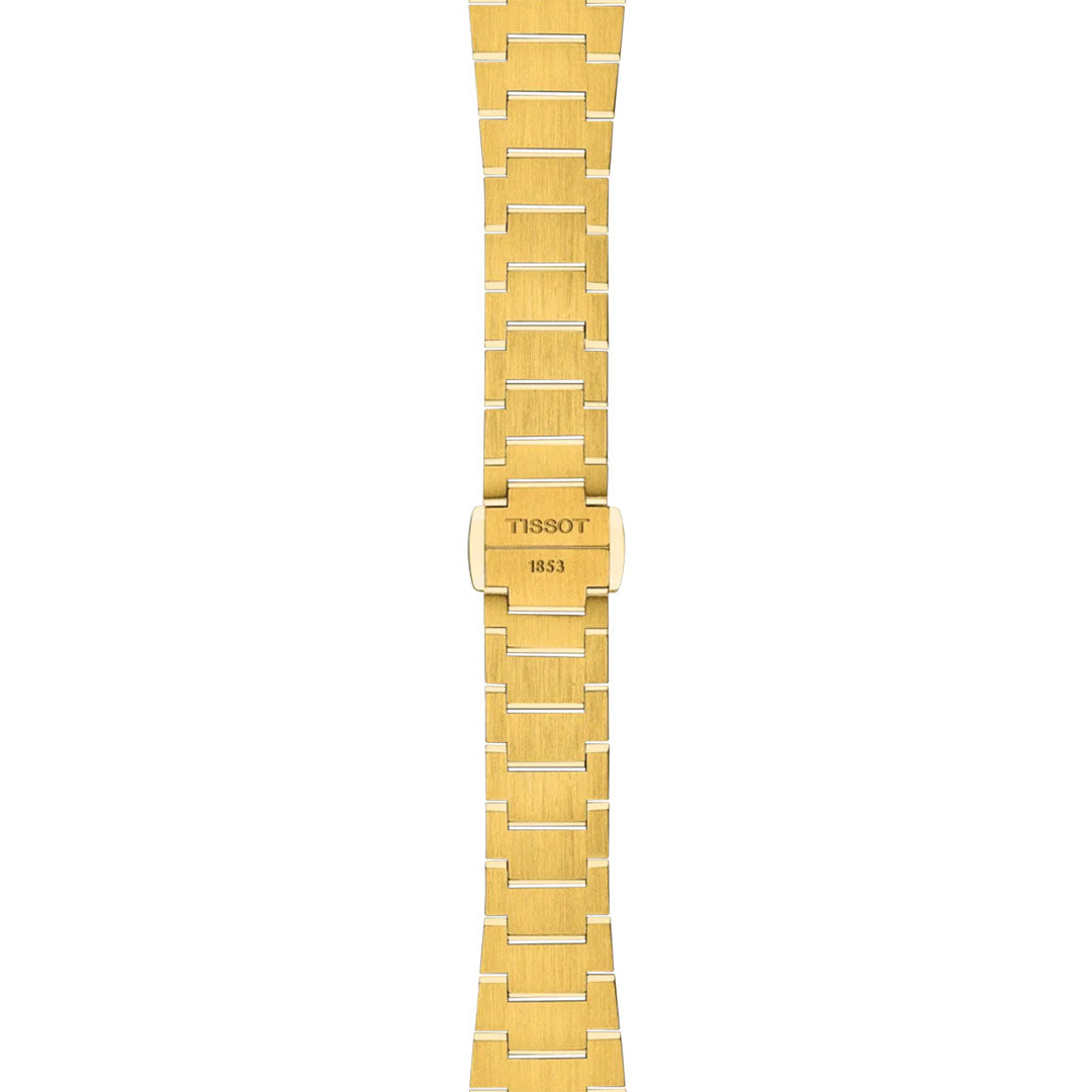 This gold stainless steel band with a brushed finish and rectangular links, engraved "TISSOT 1853" on the clasp, is designed for the Tissot PRX Quartz 25mm Watch. Shown vertically on a white background.