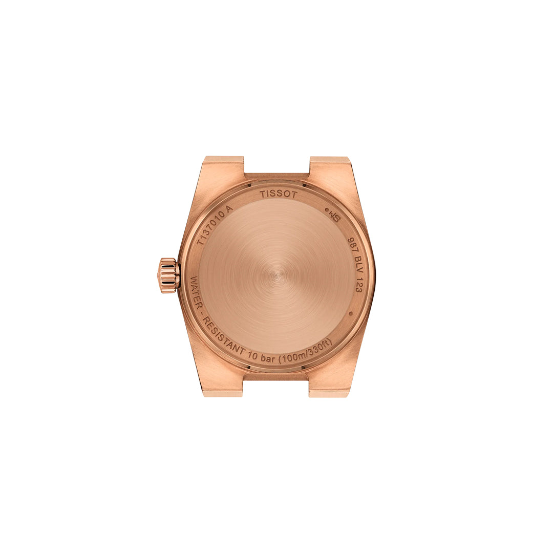 The Tissot PRX Quartz 25mm features a rose gold brushed metal case back, left-side crown, and engraved text detailing the Tissot brand, model, quartz movement, 10 bar/100m/330ft water resistance, and more specifications.