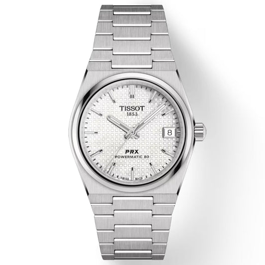 Introducing the Tissot PRX Powermatic 80 Automatic 35mm Watch, a chic timepiece featuring a textured white face and durable sapphire crystal. The watch boasts a date window at 3 o'clock, complemented by its sleek stainless steel band and minimalist design. The dial prominently displays the Tissot 1853 and PRX Powermatic 80 branding.