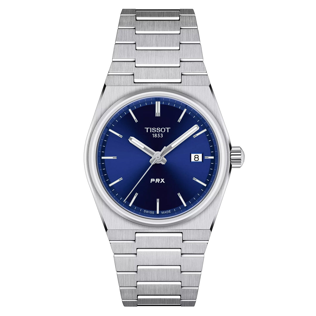 The Tissot PRX Quartz 35mm Watch combines a retro look with a stainless steel construction, blue dial, integrated bracelet, and features like white hour markers, "Tissot" and "1853," a date window at 3 o'clock, and "PRX" above 6 o'clock.