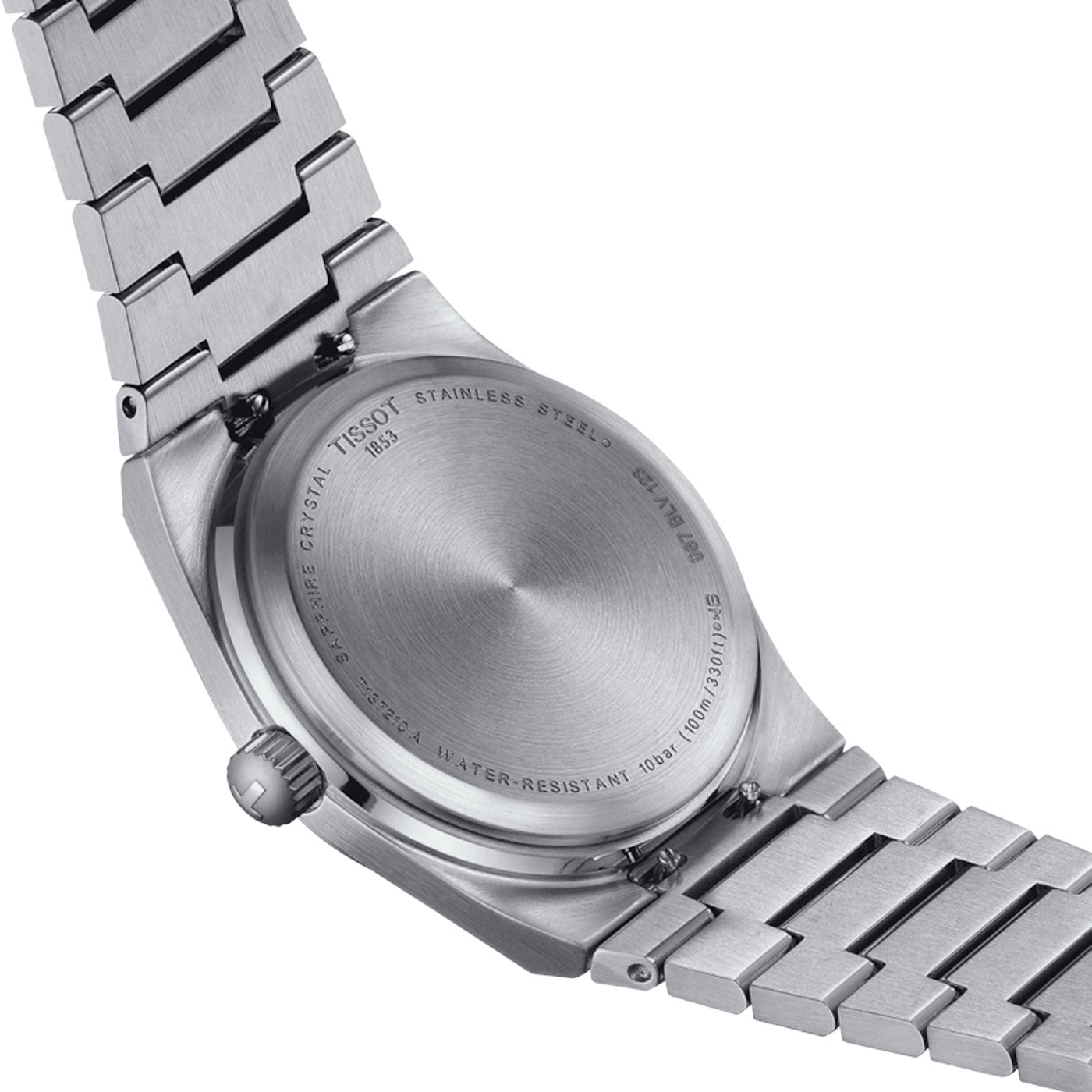 The back view of the Tissot PRX Quartz 35mm Watch showcases a stainless steel case with an elegant metal bracelet. Engraved text details its features such as "Sapphire Crystal," "Stainless Steel," "Water Resistance," and the brand name "Tissot." The watch is powered by Swiss Quartz Movement.