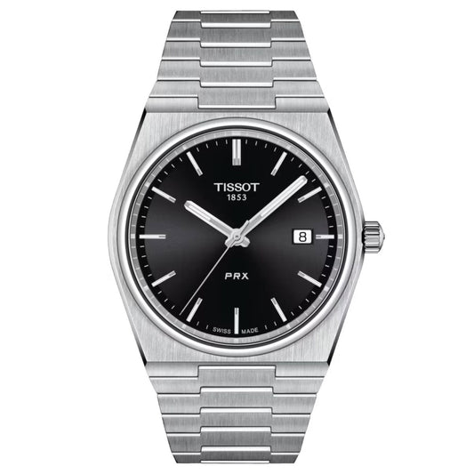 The Tissot PRX Quartz 40mm Watch, crafted by Tissot, includes a stainless steel bracelet and a sophisticated black dial. Its face features silver hour markers, hands, and a date window positioned at 3 o'clock. This elegant timepiece is designed with scratch-resistant sapphire crystal and reflects the precision of Swiss quartz movement.