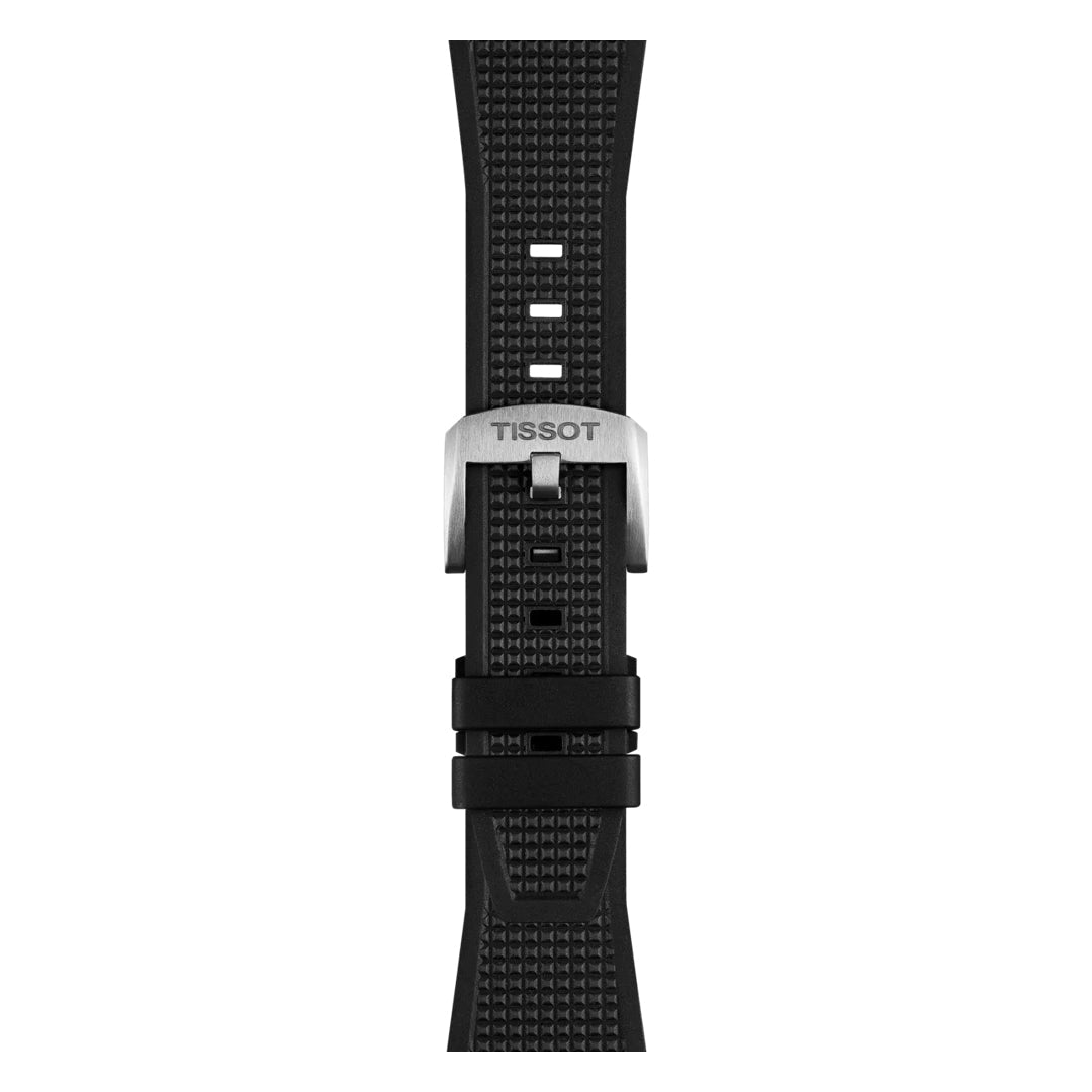 Close-up of the Tissot PRX Quartz 40mm Watch's black textured strap, featuring a silver buckle with the "TISSOT" logo and multiple sizing holes, blending modern-vintage style from Tissot.