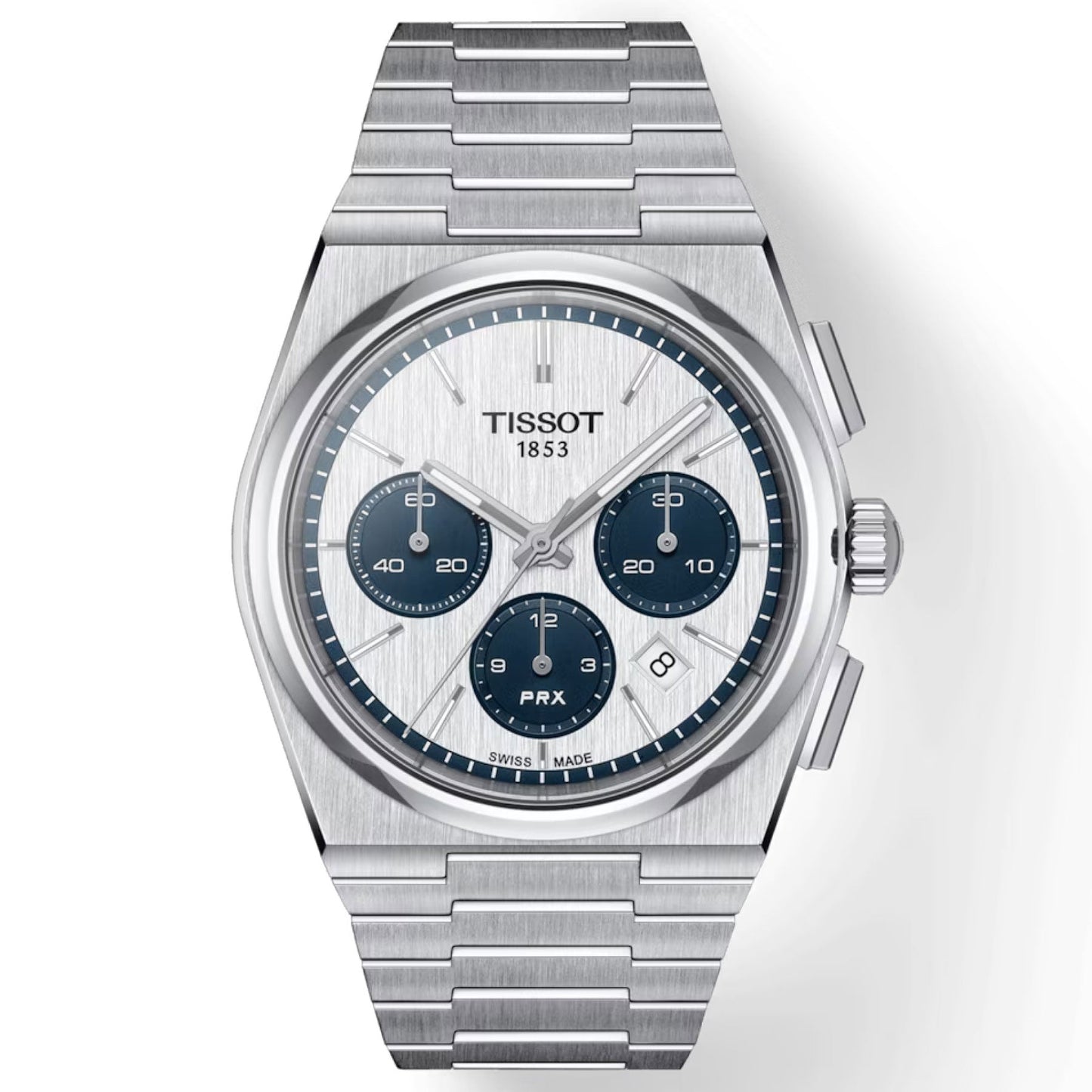 The Tissot PRX Automatic Chronograph 42mm Watch, in a sleek silver finish, features a captivating reverse panda dial with three deep blue subdials set against its white face. This watch is powered by the durable Valjoux A05.H31 calibre and includes baton hour markers and a date function positioned at 4 o'clock. It is elegantly completed with a stainless steel bracelet and polished bezel.