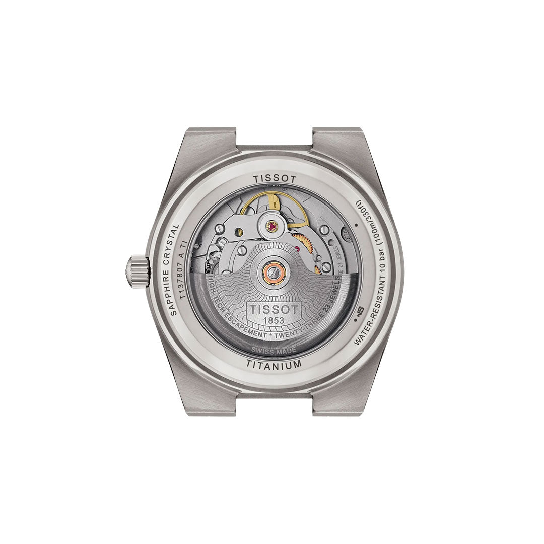 The back of the Tissot PRX Titanium Powermatic 80 Automatic 38mm Watch reveals its mechanical movement, engraved water resistance, sapphire crystal details, and Tissot branding—showcasing precision craftsmanship.