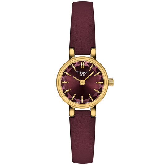 The Tissot Lovely Round Quartz 19.5mm features a gold-tone case, burgundy dial with gold markers, and matching burgundy leather strap. "Tissot 1853" graces the scratch-resistant sapphire glass face for an elegant touch.