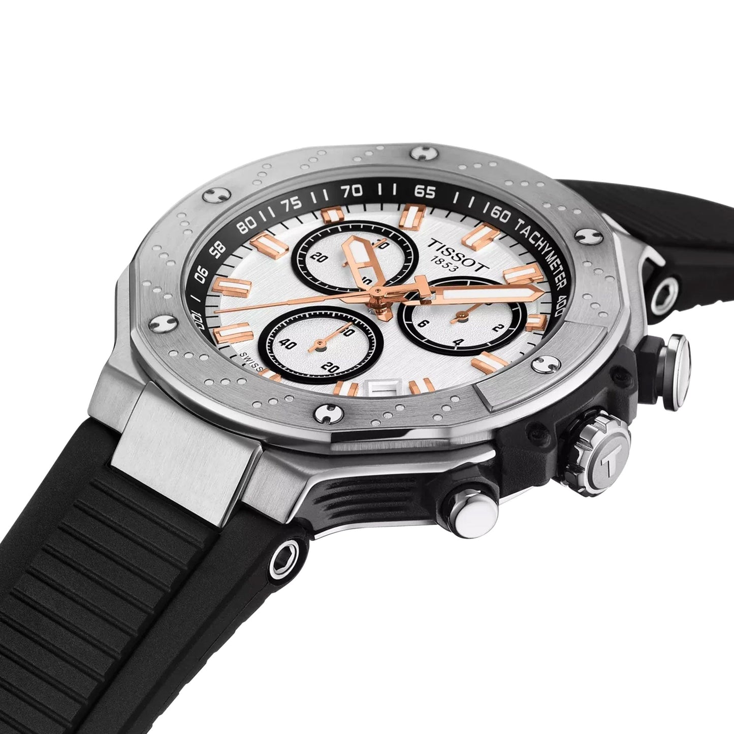 A Tissot T-Race Chronograph Quartz 45mm watch with a silver case, white dial, black subdials, rose gold hour markers, and a black rubber strap, shown angled to highlight its textured bezel and bold crown.