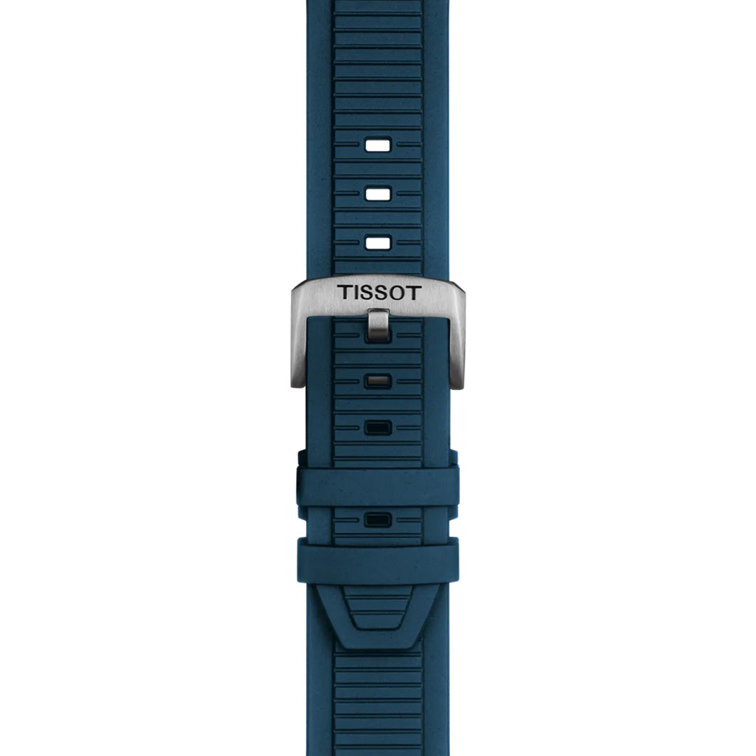 A close-up of the blue textured strap on the Tissot T-Race Chronograph Quartz 45mm Watch, featuring a silver "TISSOT" buckle, rectangular adjustment holes, and a geometric pattern—ideal for cycling enthusiasts.