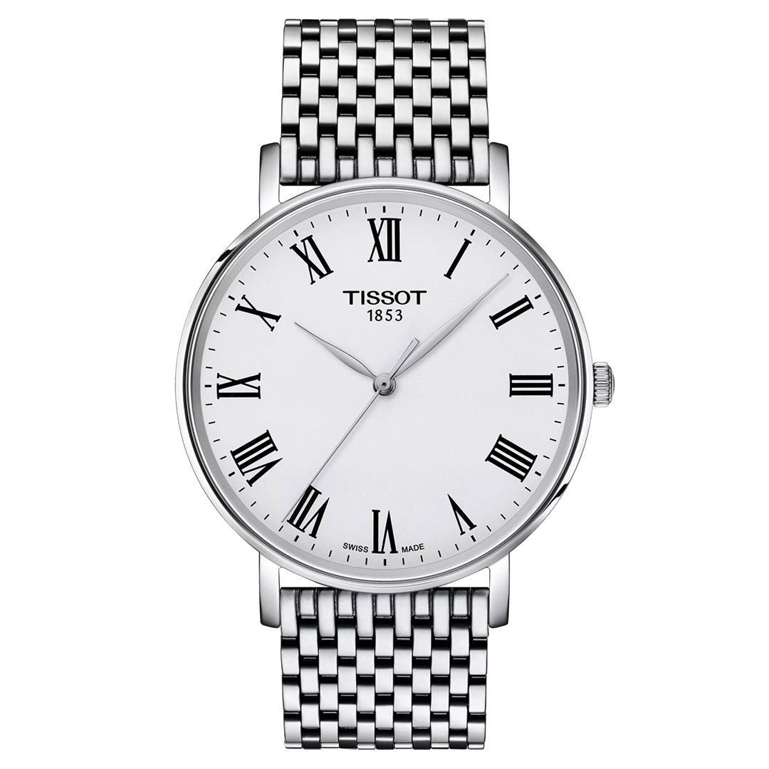 The Tissot Everytime Quartz 40mm Watch features a white dial with black Roman numerals, slim black hands, and a stainless steel bracelet. "TISSOT 1853" is printed on the face of this Swiss-made watch.