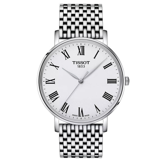 The Tissot Everytime Quartz 40mm Watch features a white dial with black Roman numerals, slim black hands, and a stainless steel bracelet. "TISSOT 1853" is printed on the face of this Swiss-made watch.