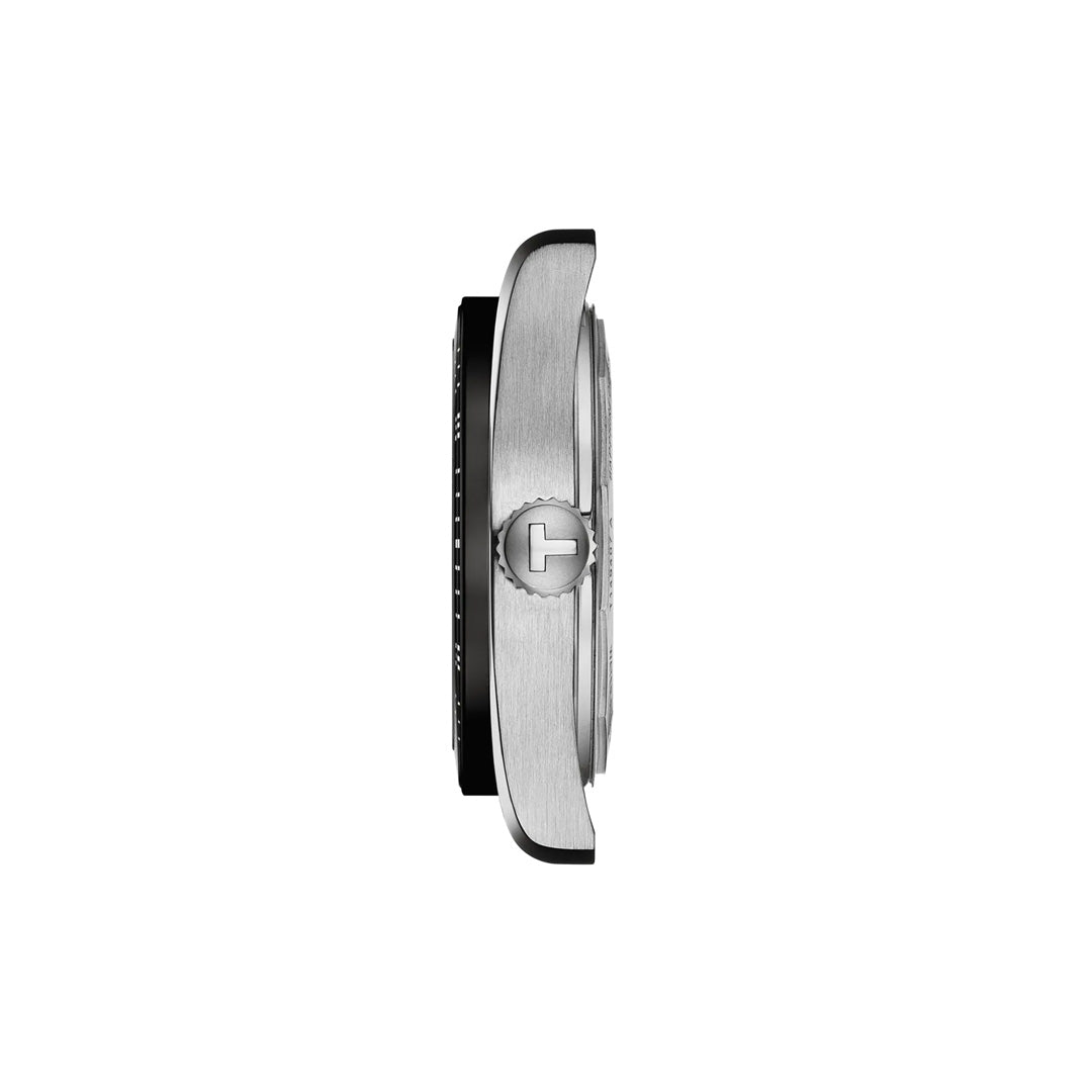 Side view of the Tissot PR516 Powermatic 80 Automatic 38mm Watch’s silver stainless-steel case with a textured crown featuring the "T" logo, highlighting its slim profile against a white background.