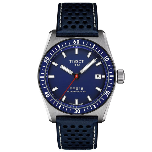 The Tissot PR516 Powermatic 80 Automatic 38mm Watch features a blue dial with white indices, a date display, numeral-marked bezel, and is paired with a perforated black strap. The "Powermatic 80" movement is elegantly printed on the dial.