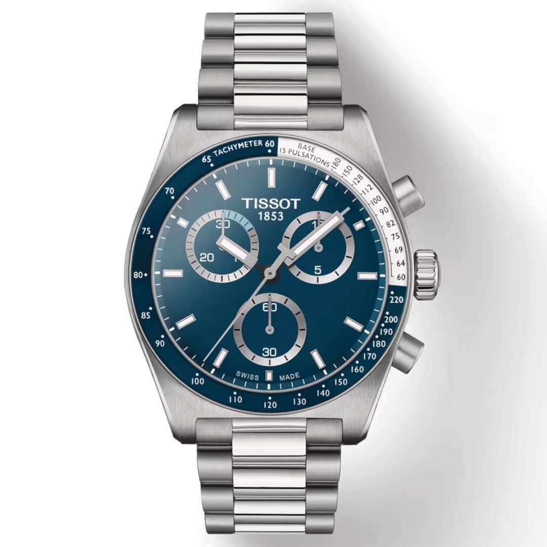 The Tissot PR516 Chronograph Quartz 40mm Watch showcases a stainless steel bracelet and a blue dial equipped with three subdials and a date window. Its bezel is enhanced by a tachymeter scale, while the polished finish and sleek design highlight the elegance associated with the Tissot brand.