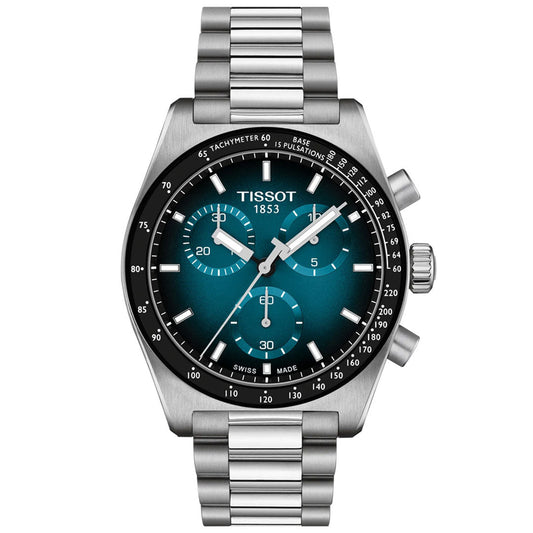 The Tissot PR516 Chronograph Quartz 40mm Watch features a stainless steel band, blue gradient dial with three subdials, white hour markers, and dual pushers, displaying the time as 1:51:53.