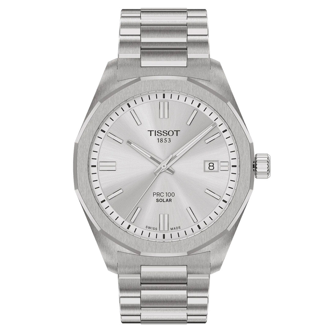 The Tissot PRC 100 Solar Quartz 39mm Watch features a stainless steel band, minimalist silver dial with baton markers, date at 3 o'clock, and a smooth bezel.