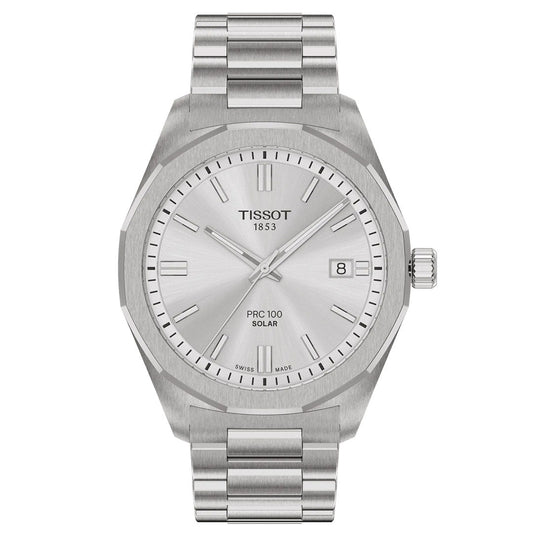 The Tissot PRC 100 Solar Quartz 39mm Watch features a stainless steel band, minimalist silver dial with baton markers, date at 3 o'clock, and a smooth bezel.