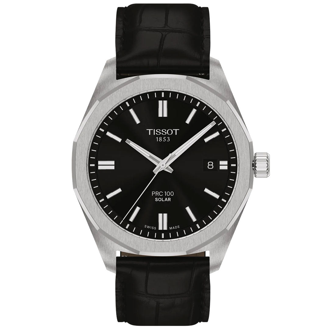 The Tissot PRC 100 Solar Quartz 39mm Watch features a black leather strap, silver case, black dial with silver hour markers, date at 3 o'clock, and "Tissot 1853" branding on the face.