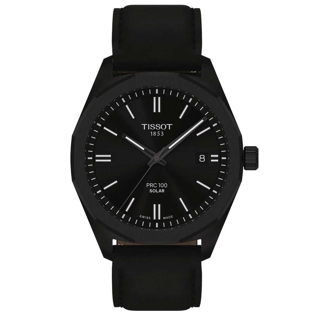 The Tissot PRC 100 Solar Quartz 39mm Watch features a black leather strap, minimalist black dial with white hour markers, date window at 3 o’clock, and "TISSOT 1853 PRC 100 SOLAR" text—combining elegant design with solar-powered innovation.