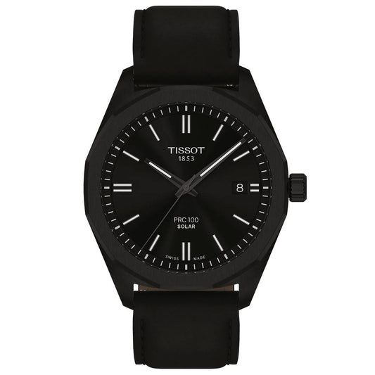 The Tissot PRC 100 Solar Quartz 39mm Watch features a black leather strap, minimalist black dial with white hour markers, date window at 3 o’clock, and "TISSOT 1853 PRC 100 SOLAR" text—combining elegant design with solar-powered innovation.