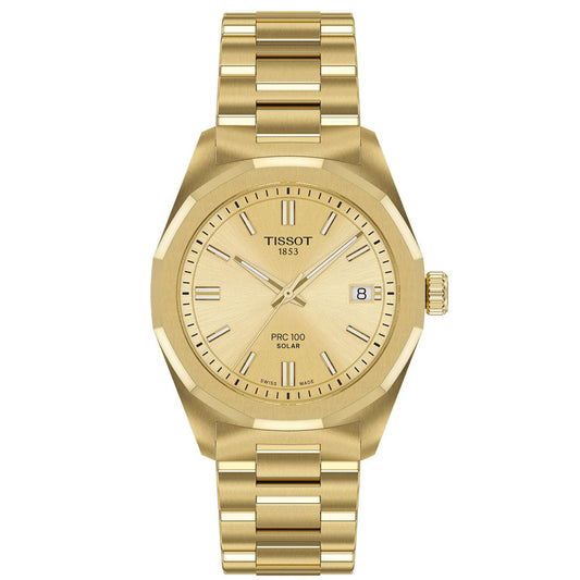 The Tissot PRC 100 Solar Quartz 34mm watch features a gold metal band, minimalist dial with baton markers, date at 3 o’clock, and Tissot 1853 branding—a stylish and eco-friendly solar-powered timepiece.
