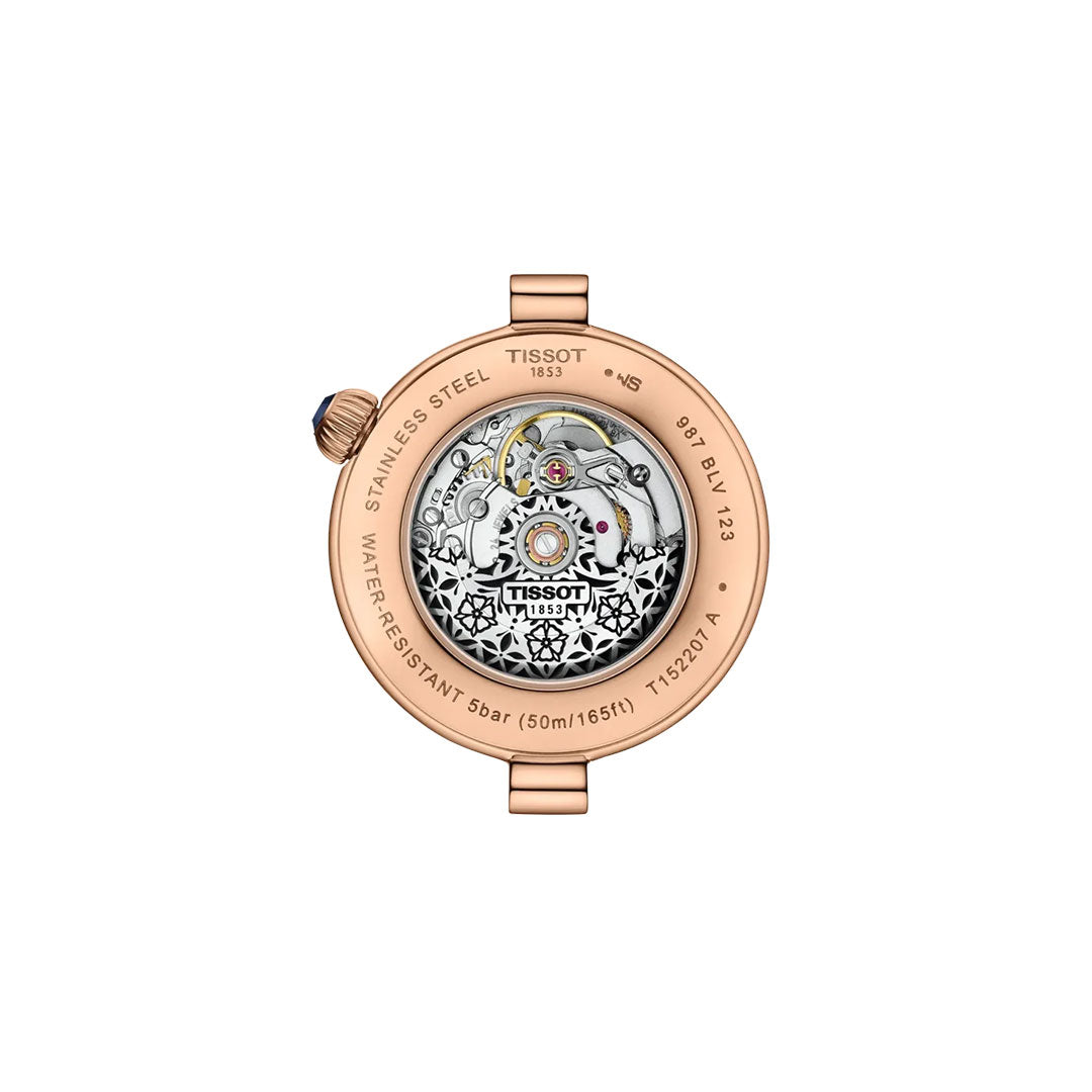 Back view of the Tissot Desir Automatic 28mm Watch by Tissot, featuring a rose gold-colored stainless steel case and a see-through back displaying its automatic movement with engraved specs around the edge.