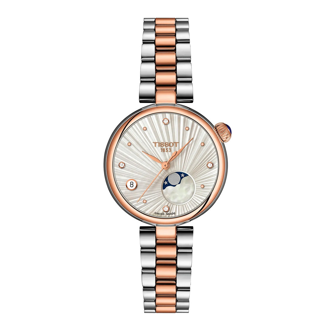 The Tissot Desir Moonphase Quartz 29.6mm Watch by Tissot features a stylish silver and rose gold stainless-steel bracelet, a round case with diamond hour markers, a textured white dial, and a moonphase display—an elegant quartz timepiece suited for any occasion.