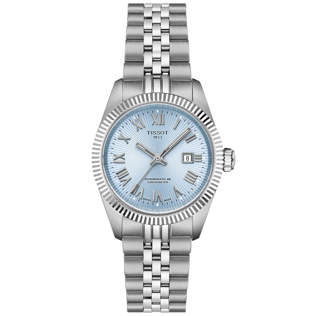 The Tissot Ballade Powermatic 80 Automatic 30mm features a silver metal link band, light blue textured dial with silver Roman numerals, date at 3 o'clock, fluted bezel, and a chronometer-certified COSC movement for precise timekeeping.