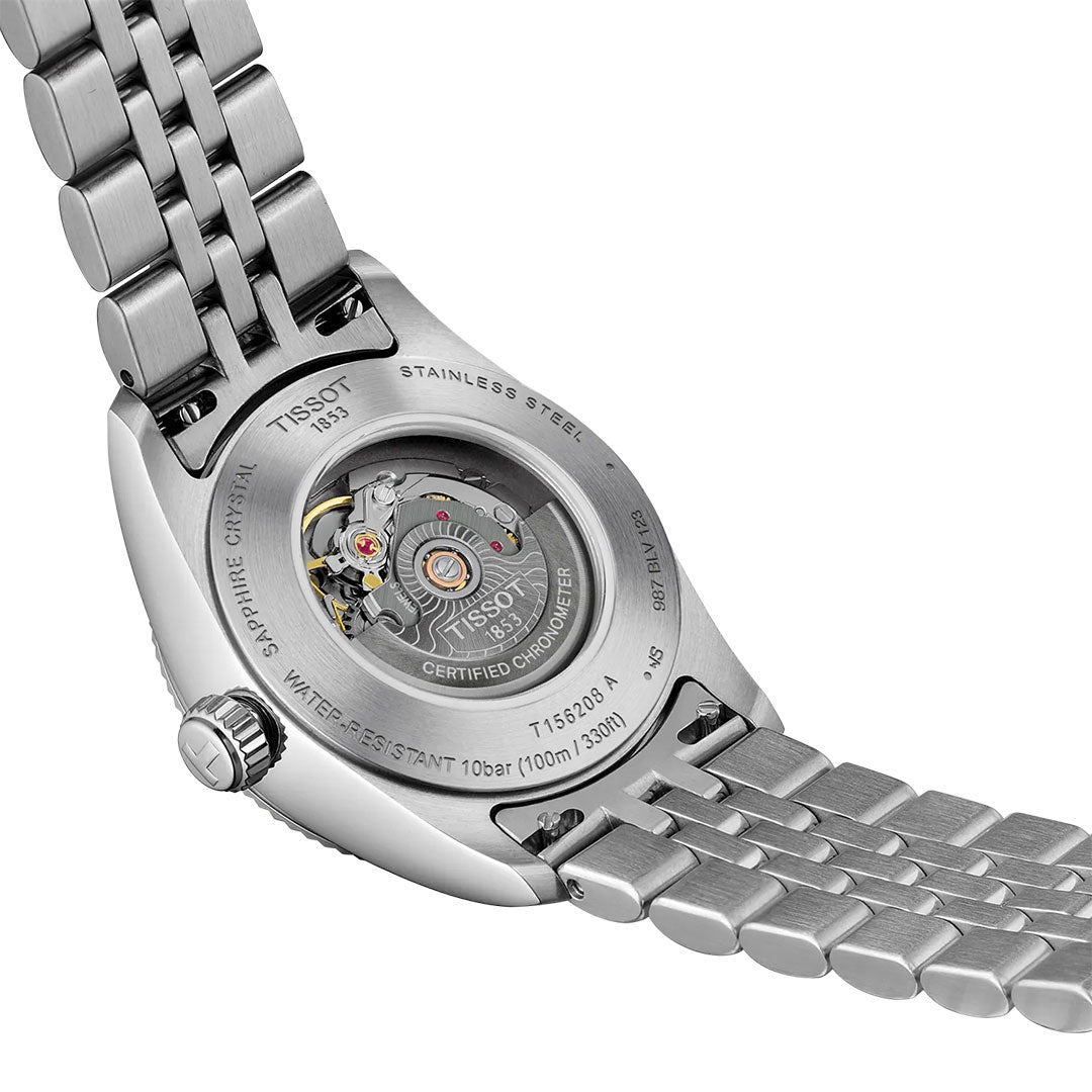 Close-up of the Tissot Ballade Powermatic 80 Automatic 30mm Watch's stainless steel back, showcasing its transparent case and intricate Powermatic 80 movement, with engraved details on this chronometer-certified Tissot timepiece.