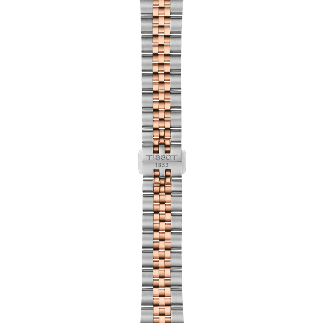 The Tissot Ballade Quartz 34mm Watch bracelet, shown from above on a white background, features alternating silver and rose gold links, a "Tissot 1853" engraved central clasp, and an interchangeable design.