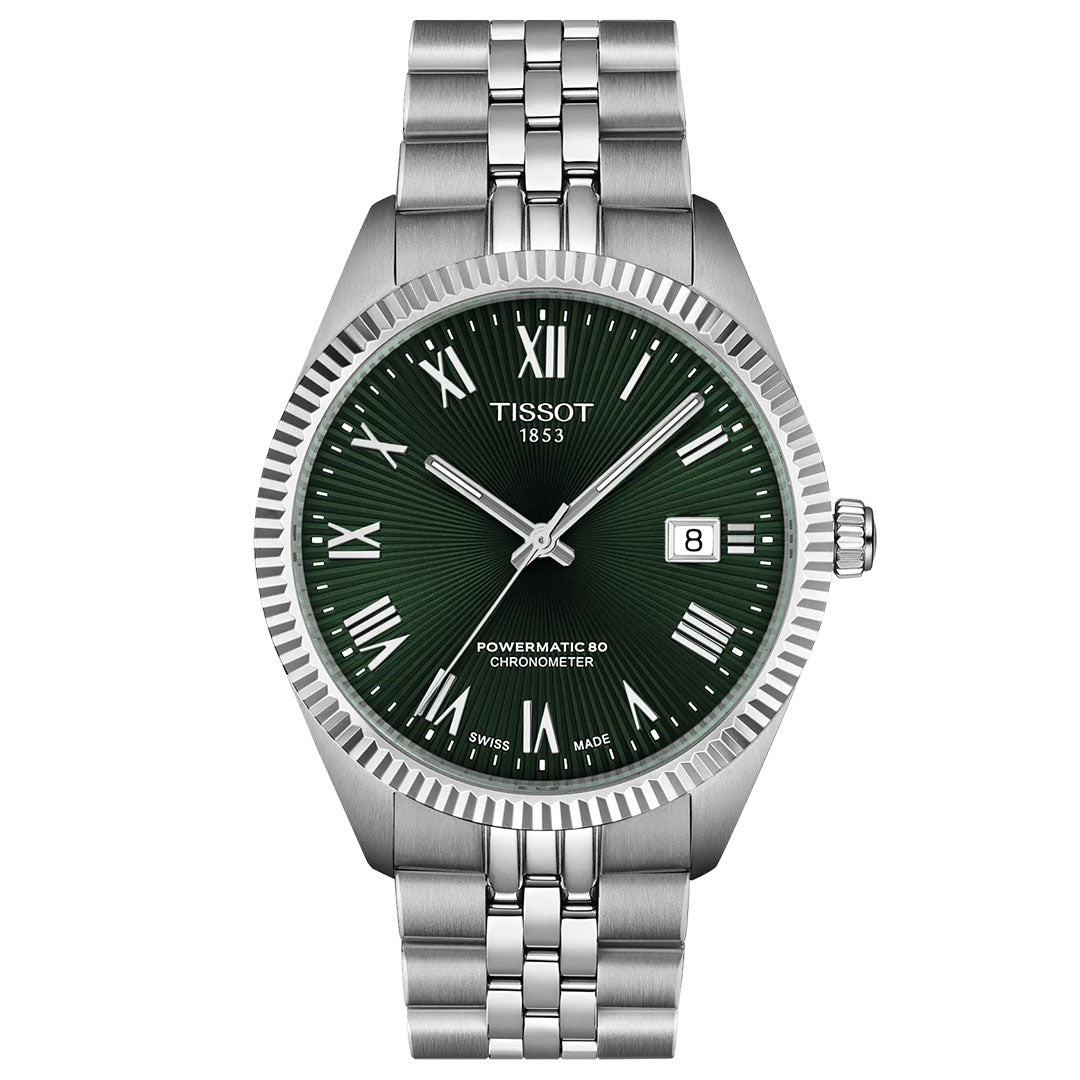 The Tissot Ballade Powermatic 80 Automatic 39mm Watch features a silver metal bracelet, green dial with Roman numerals, date at 3 o’clock, “Powermatic 80 Chronometer” at 6 o’clock, and a chronometer-certified movement.