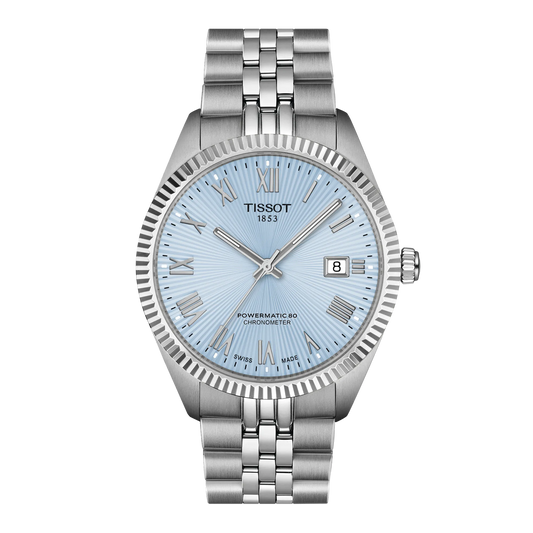 Tissot Ballade Powermatic 80 Automatic 39mm Watch featuring a silver-tone finish, light blue dial, fluted bezel, link bracelet, and Powermatic 80 movement.