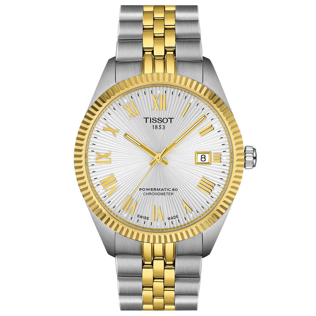 The Tissot Ballade Powermatic 80 Automatic 39mm Watch features a silver and gold metal band, silver dial with gold Roman numerals and hands, a fluted gold bezel, date at 3 o’clock, and chronometer-certified Powermatic 80 movement.