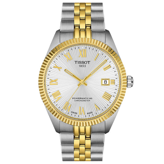 The Tissot Ballade Powermatic 80 Automatic 39mm Watch features a silver and gold metal band, silver dial with gold Roman numerals and hands, a fluted gold bezel, date at 3 o’clock, and chronometer-certified Powermatic 80 movement.