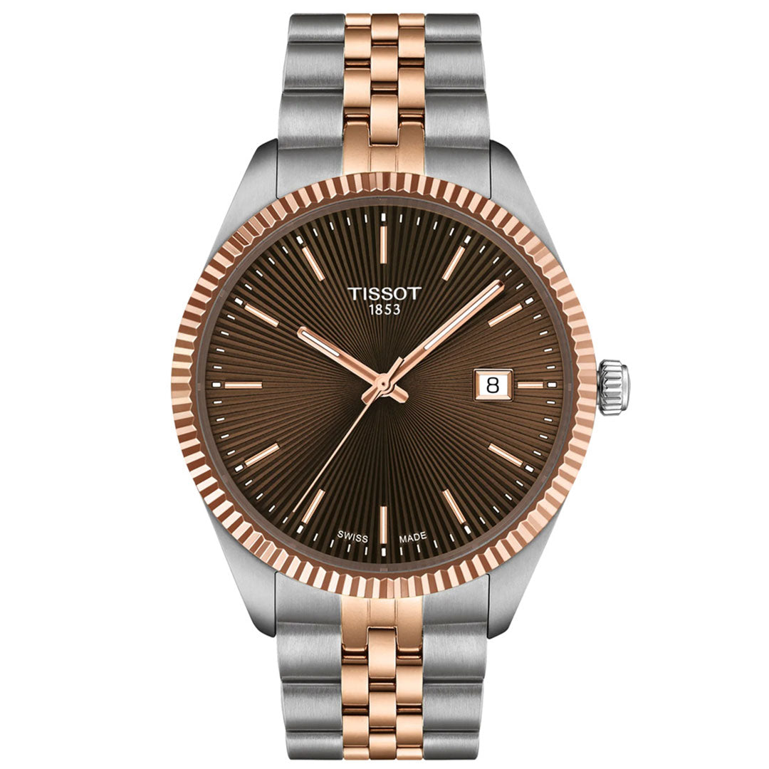 The Tissot Ballade Quartz 40mm Watch features a brown sunburst guilloché dial, gold-tone hour markers, date display at 3 o’clock, and a two-tone stainless steel and rose gold interchangeable bracelet.