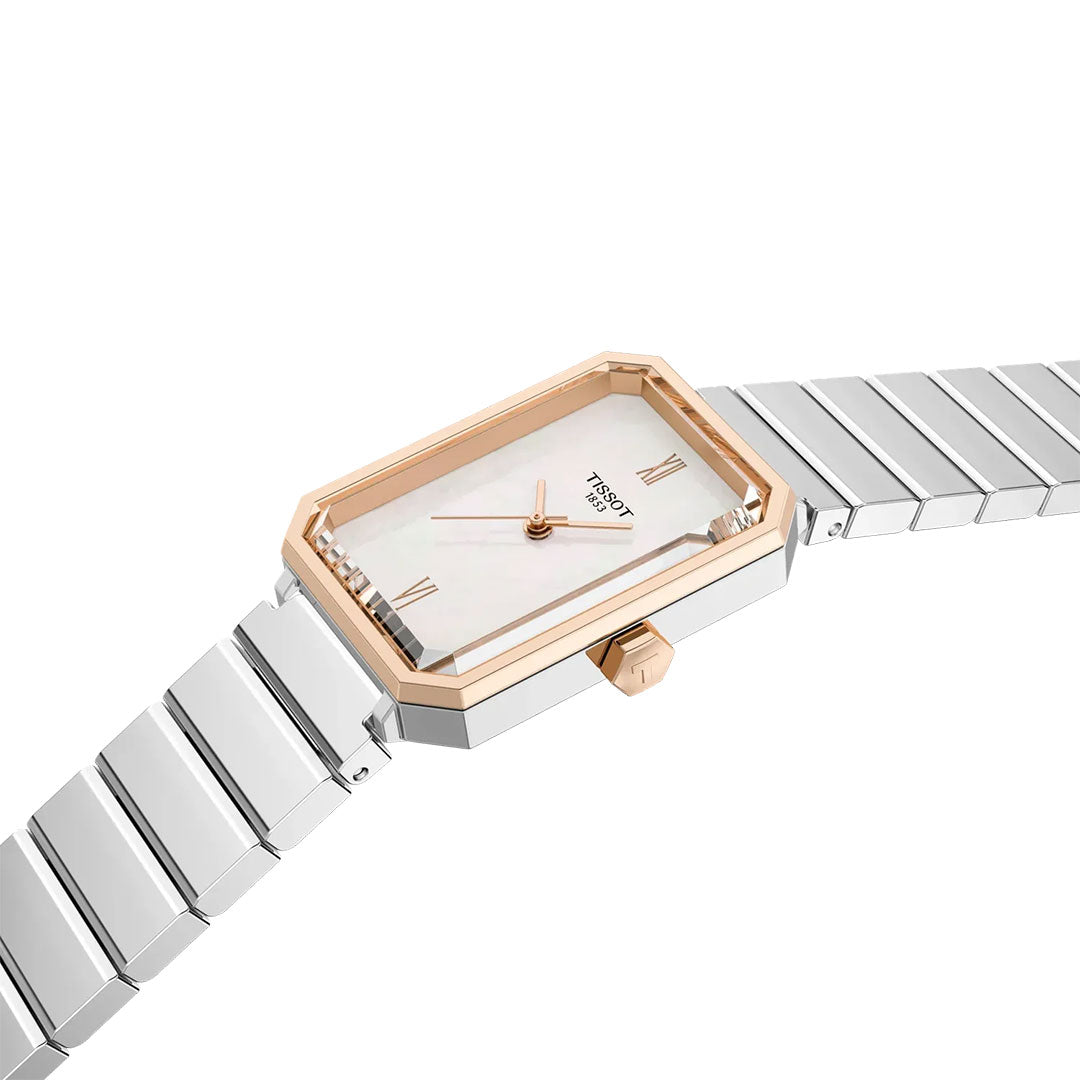 The Tissot SRV Quartz 30mm Watch by Tissot features an Art Deco rectangular face, rose gold bezel, white dial with gold hands, Roman numerals at 12 and 6, a silver metal link band, and a rose gold crown for timeless elegance.