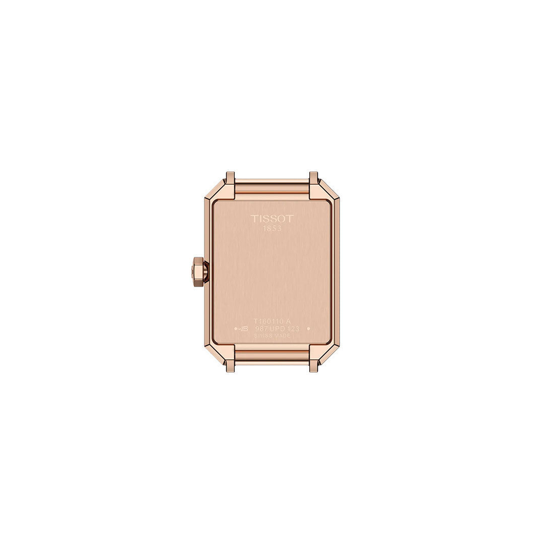 The Tissot SRV Quartz 30mm Watch features a rectangular sapphire case with engraved text and four screws at each corner on the back, plus a crown on the left side. Its simple, unembellished back echoes classic Art Deco style.