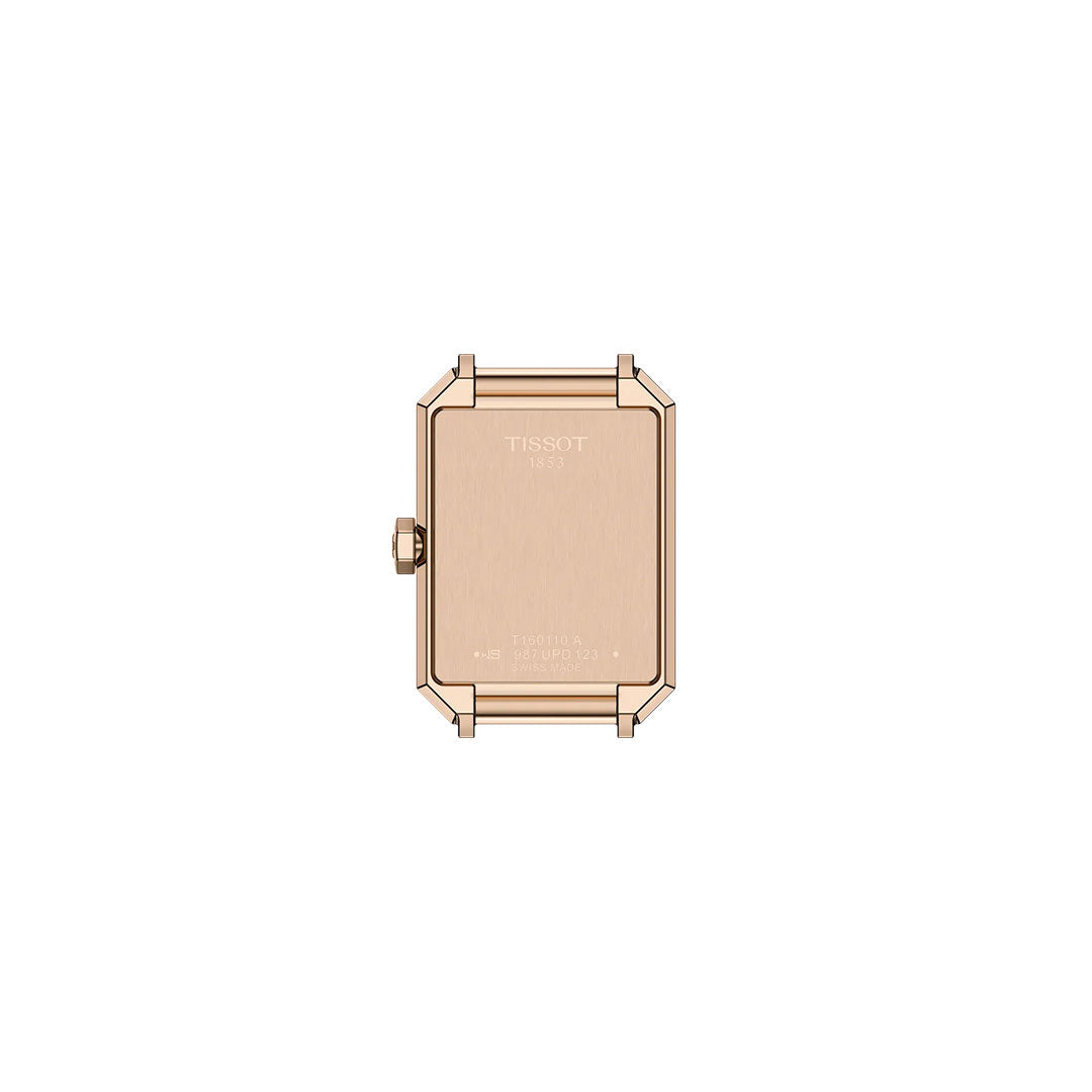 The back of the rectangular Tissot SRV Quartz 30mm Watch case in rose gold, with left-side crown and engraved text, reveals classic Art Deco influences in its sapphire design; no strap or dial is visible.
