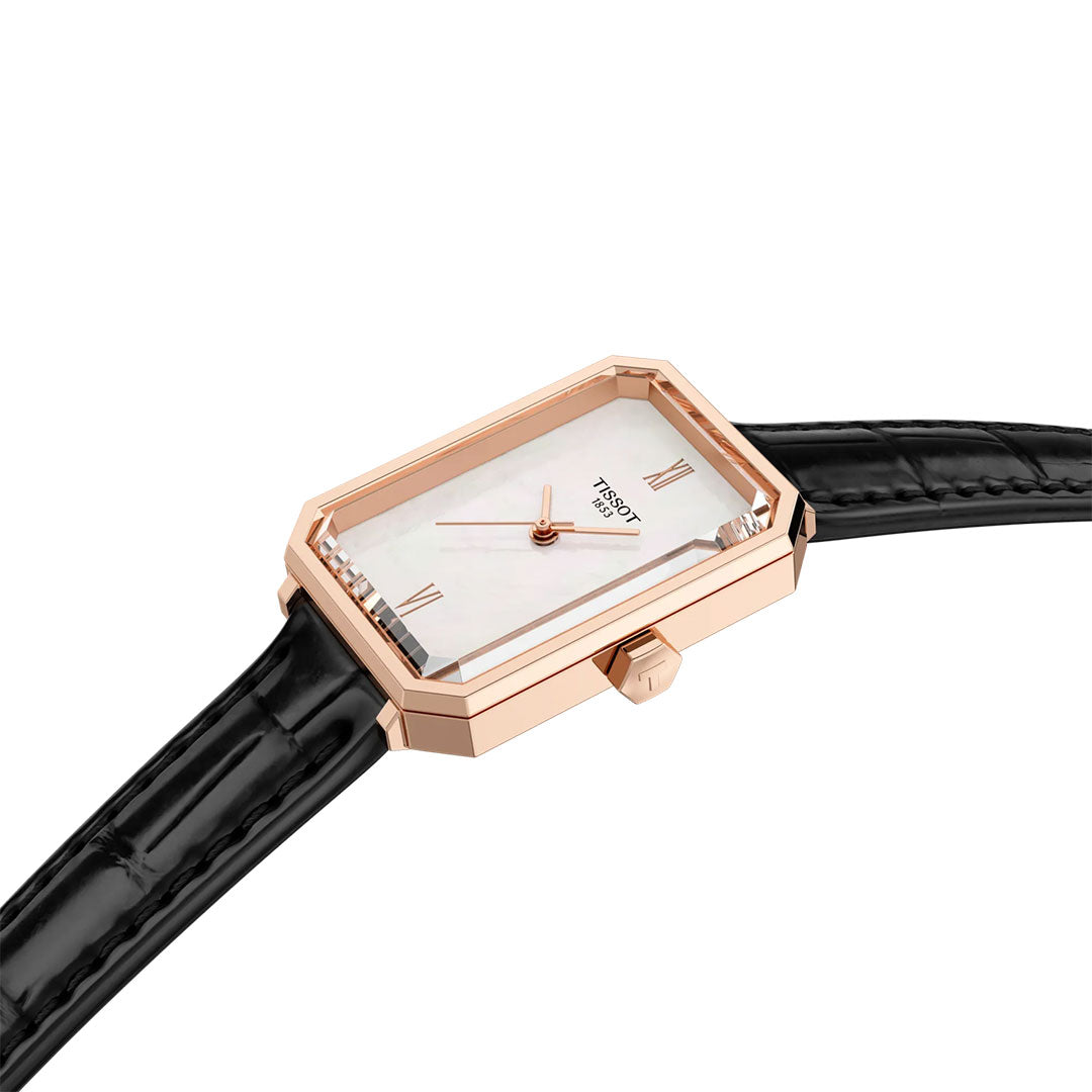 The Tissot SRV Quartz 30mm Watch by Tissot, featuring a rectangular rose gold case, white dial, and black leather strap, is displayed at an angle on a white background.