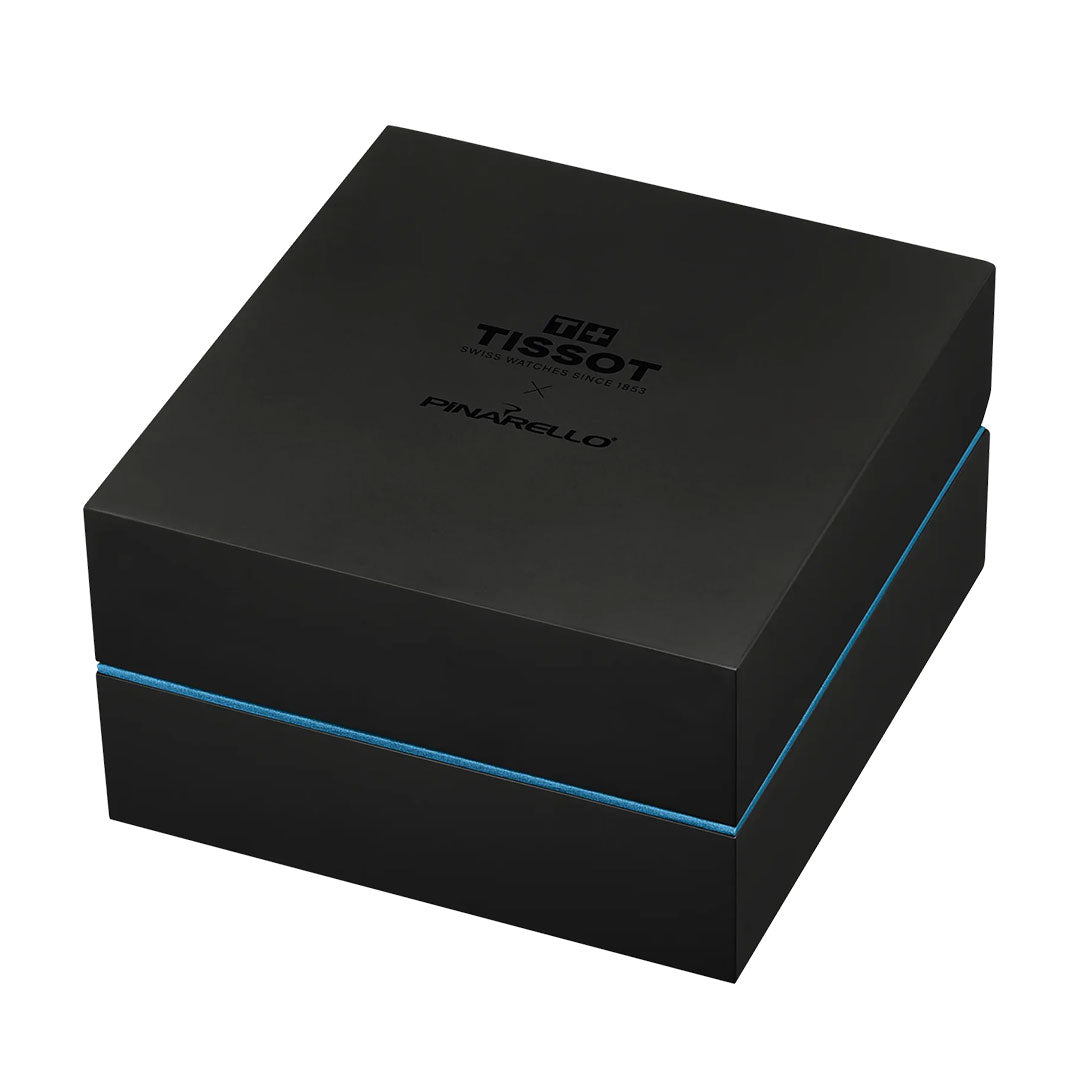 A black square box with "Tissot" and "Pinarello" logos on the lid houses the Tissot Pinarello Mechanical Automatic COSC 43mm Watch, featuring sleek edges, a blue trim, and a tribute to the iconic cycling brand.
